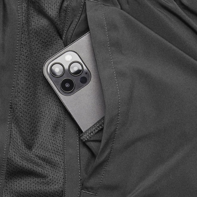 PANTALON CORTO UNDER ARMOUR GRIS 2X1